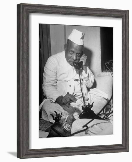 Brokers Speaking on Telephone at Bombay Stock and Cotton Exchanges-Margaret Bourke-White-Framed Photographic Print