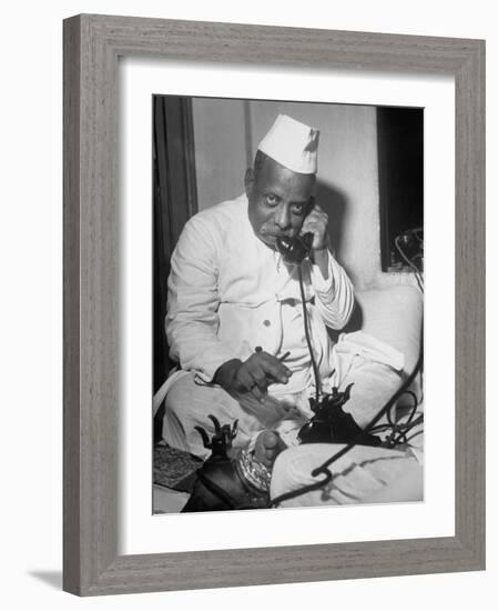 Brokers Speaking on Telephone at Bombay Stock and Cotton Exchanges-Margaret Bourke-White-Framed Photographic Print