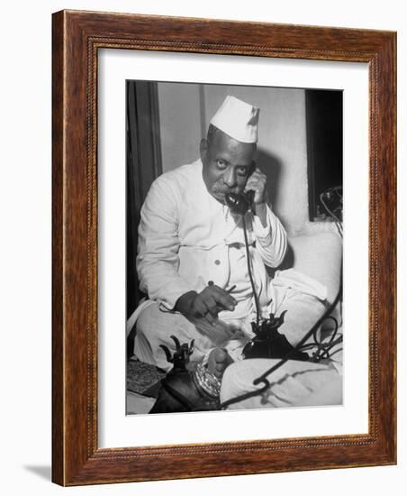 Brokers Speaking on Telephone at Bombay Stock and Cotton Exchanges-Margaret Bourke-White-Framed Photographic Print