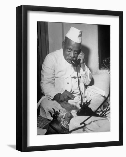 Brokers Speaking on Telephone at Bombay Stock and Cotton Exchanges-Margaret Bourke-White-Framed Photographic Print