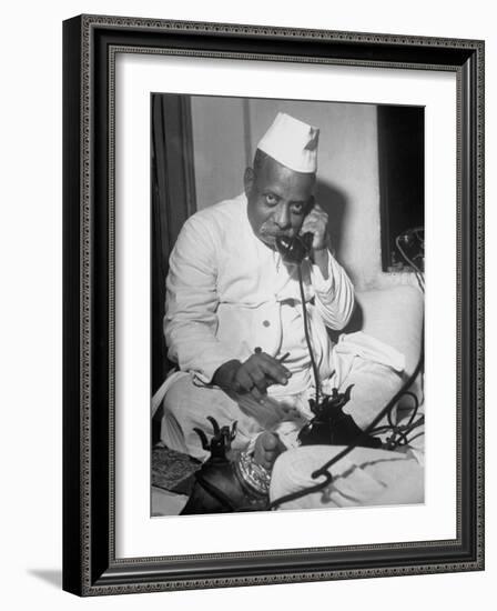 Brokers Speaking on Telephone at Bombay Stock and Cotton Exchanges-Margaret Bourke-White-Framed Photographic Print