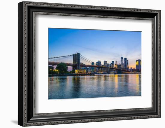 Brooklyn Bridge and Manhattan skyline at dusk, viewed from the East River, New York City, United St-Fraser Hall-Framed Photographic Print