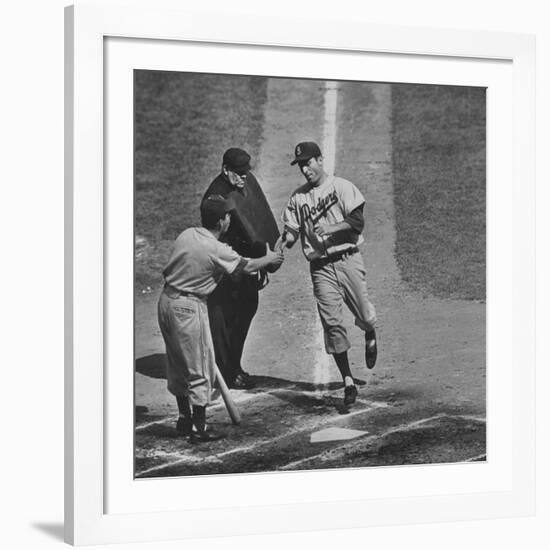 Brooklyn Dodger Carl Furillo Greeted by Batboy at Home Plate, World Series, Yankee Stadium-Ralph Morse-Framed Premium Photographic Print