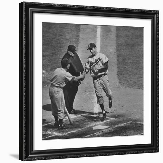 Brooklyn Dodger Carl Furillo Greeted by Batboy at Home Plate, World Series, Yankee Stadium-Ralph Morse-Framed Premium Photographic Print