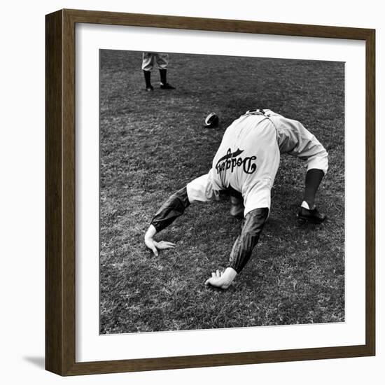 Brooklyn Dodgers Pitcher Ed Albosta Doing Stretching Exercise During Spring Training-William Vandivert-Framed Premium Photographic Print