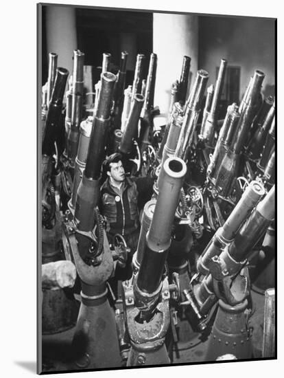 Brooklyn Naval Yard Worker Looking over a Storage of Guns-George Strock-Mounted Photographic Print