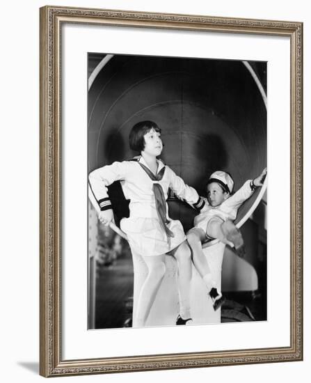 Brother and Sister Playing around on a Big Ship-null-Framed Photo