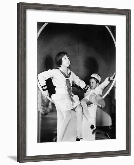 Brother and Sister Playing around on a Big Ship-null-Framed Photo