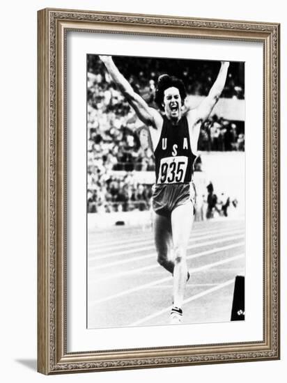 Bruce Jenner Just after Crossing the Finish Line to Win the Decathlon-null-Framed Photo