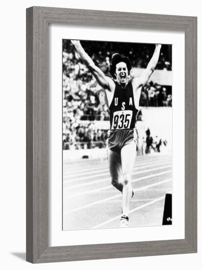 Bruce Jenner Just after Crossing the Finish Line to Win the Decathlon-null-Framed Photo