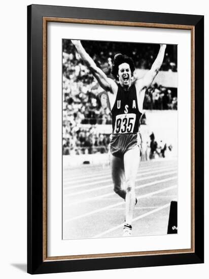 Bruce Jenner Just after Crossing the Finish Line to Win the Decathlon-null-Framed Photo