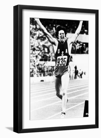 Bruce Jenner Just after Crossing the Finish Line to Win the Decathlon-null-Framed Photo