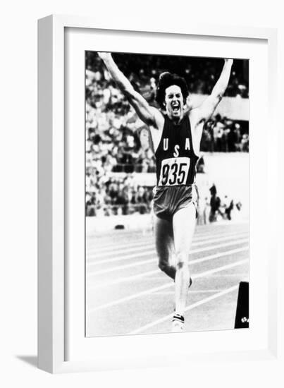 Bruce Jenner Just after Crossing the Finish Line to Win the Decathlon-null-Framed Photo