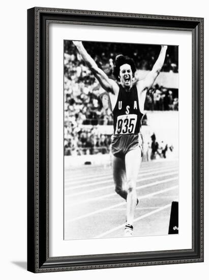 Bruce Jenner Just after Crossing the Finish Line to Win the Decathlon-null-Framed Photo