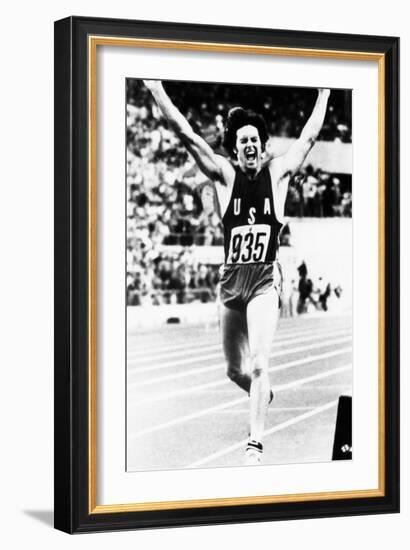 Bruce Jenner Just after Crossing the Finish Line to Win the Decathlon-null-Framed Photo