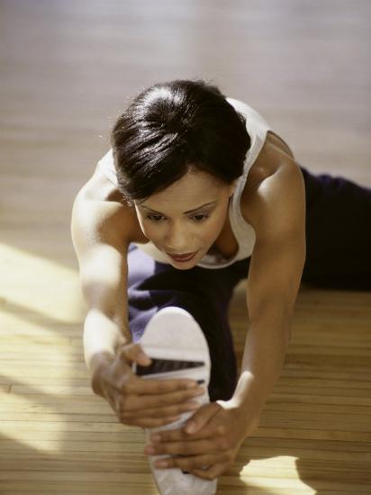 Brunette Stretching Photographic Print