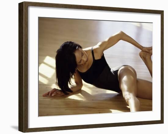 Brunette Stretching-null-Framed Photographic Print