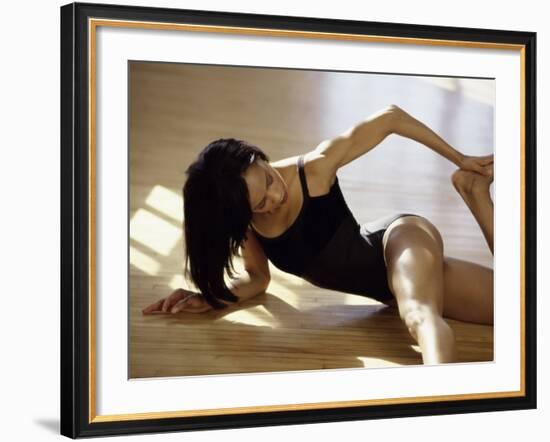 Brunette Stretching-null-Framed Photographic Print