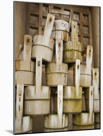 Buckets Stacked at Yasaka Shrine in Kyoto-Rudy Sulgan-Mounted Photographic Print