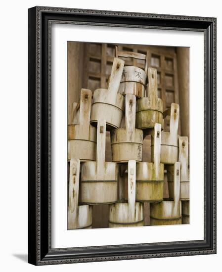 Buckets Stacked at Yasaka Shrine in Kyoto-Rudy Sulgan-Framed Photographic Print