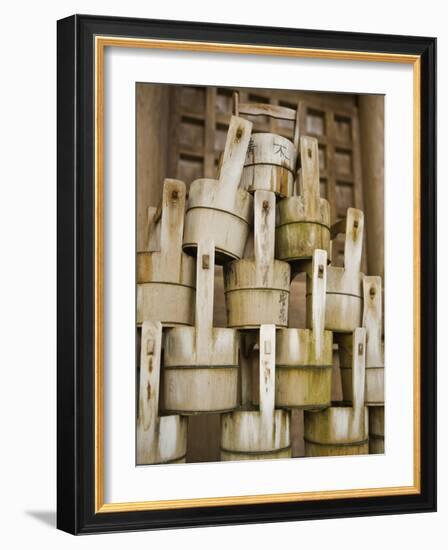 Buckets Stacked at Yasaka Shrine in Kyoto-Rudy Sulgan-Framed Photographic Print