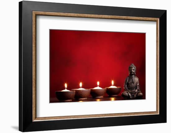 Buddha and Candles on Red Background, Religious Concept.-Sofiaworld-Framed Photographic Print