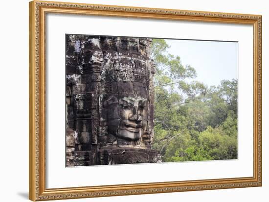 Buddha Face Carved in Stone at the Bayon Temple, Angkor Thom, Angkor, Cambodia-Yadid Levy-Framed Photographic Print