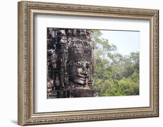 Buddha Face Carved in Stone at the Bayon Temple, Angkor Thom, Angkor, Cambodia-Yadid Levy-Framed Photographic Print