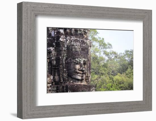 Buddha Face Carved in Stone at the Bayon Temple, Angkor Thom, Angkor, Cambodia-Yadid Levy-Framed Photographic Print