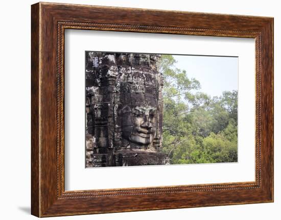 Buddha Face Carved in Stone at the Bayon Temple, Angkor Thom, Angkor, Cambodia-Yadid Levy-Framed Photographic Print