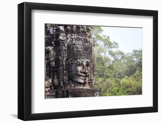 Buddha Face Carved in Stone at the Bayon Temple, Angkor Thom, Angkor, Cambodia-Yadid Levy-Framed Photographic Print