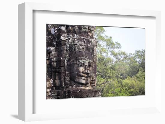 Buddha Face Carved in Stone at the Bayon Temple, Angkor Thom, Angkor, Cambodia-Yadid Levy-Framed Photographic Print