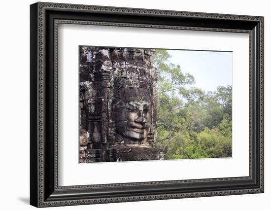 Buddha Face Carved in Stone at the Bayon Temple, Angkor Thom, Angkor, Cambodia-Yadid Levy-Framed Photographic Print