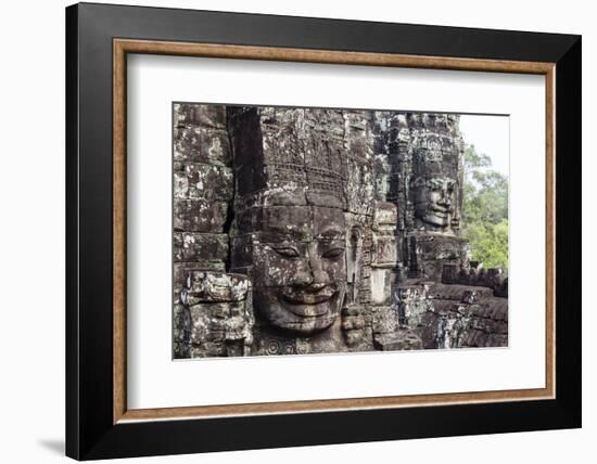 Buddha Face Carved in Stone at the Bayon Temple, Angkor Thom, Angkor, Cambodia-Yadid Levy-Framed Photographic Print