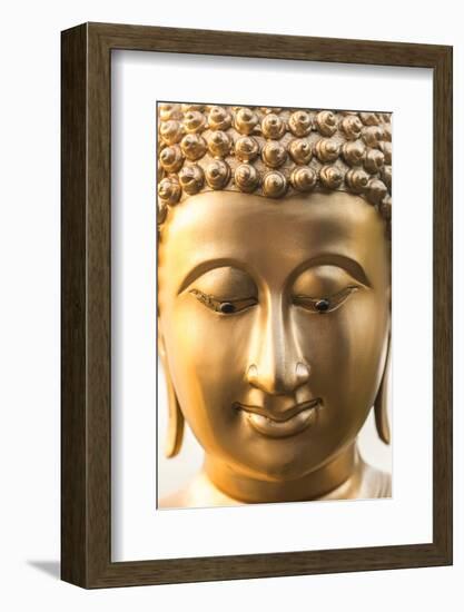 Buddha face, Seema Malaka temple on Beira Lake. Colombo, Sri Lanka-Peter Adams-Framed Photographic Print