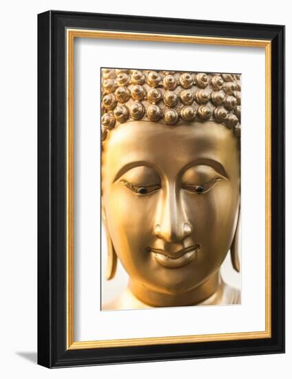 Buddha face, Seema Malaka temple on Beira Lake. Colombo, Sri Lanka-Peter Adams-Framed Photographic Print