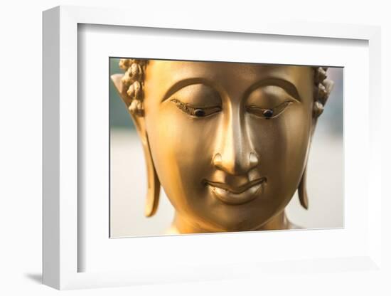 Buddha face, Seema Malaka temple on Beira Lake. Colombo, Sri Lanka-Peter Adams-Framed Photographic Print