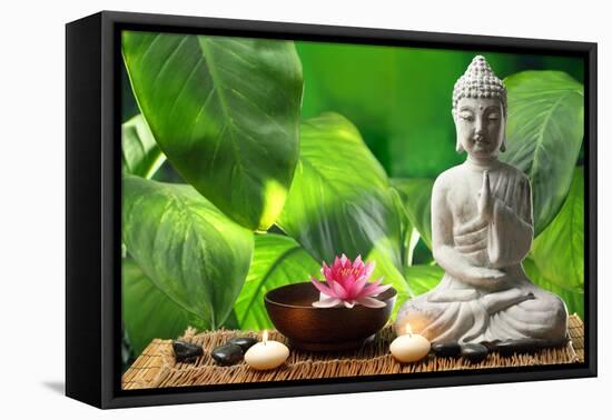 Buddha in Meditation with Lotus Flower and Burning Candles-Liang Zhang-Framed Premier Image Canvas