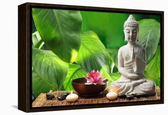 Buddha in Meditation with Lotus Flower and Burning Candles-Liang Zhang-Framed Premier Image Canvas