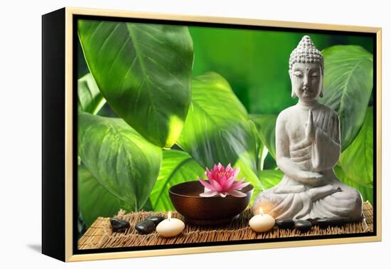 Buddha in Meditation with Lotus Flower and Burning Candles-Liang Zhang-Framed Premier Image Canvas