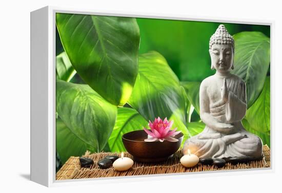 Buddha in Meditation with Lotus Flower and Burning Candles-Liang Zhang-Framed Premier Image Canvas