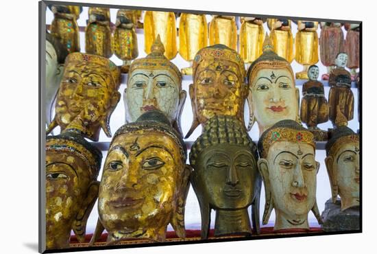 Buddha masks on display at shop, Mandalay, Myanmar (Burma)-Jan Miracky-Mounted Photographic Print