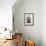 Buddha Statue and Water Pot Left by Buddhist Devotee Inside Shrine-Annie Owen-Framed Photographic Print displayed on a wall