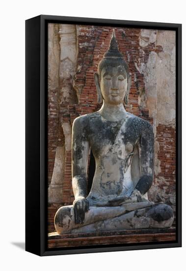 Buddha statue at Wat Mahathat, Ayutthaya Historical Park, Thailand-Art Wolfe-Framed Premier Image Canvas