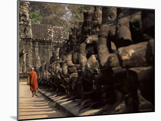 Buddhist Monk Approaching South Gate, Angkor Thom, Angkor, Cambodia, Indochina-Andrew Mcconnell-Mounted Photographic Print