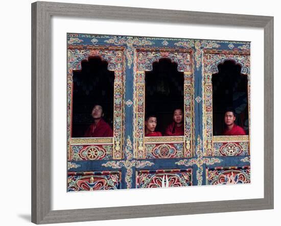 Buddhist Monks Look Through the Windows into the Courtyard of the Tango Monestary Near Thimphu-null-Framed Photographic Print