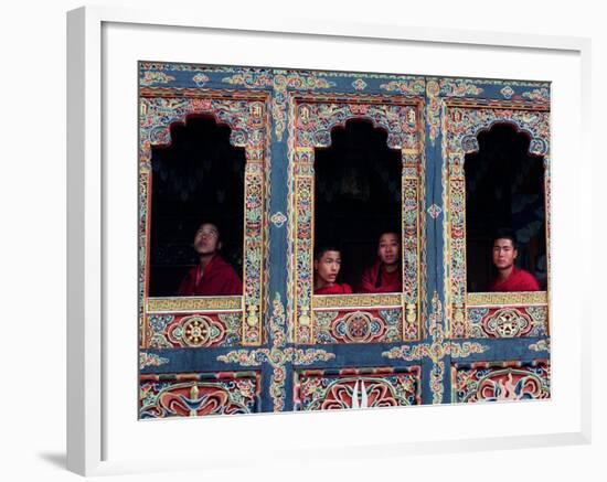 Buddhist Monks Look Through the Windows into the Courtyard of the Tango Monestary Near Thimphu-null-Framed Photographic Print