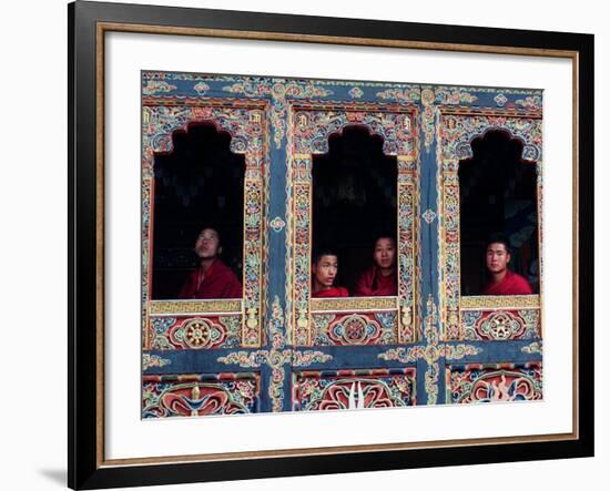 Buddhist Monks Look Through the Windows into the Courtyard of the Tango Monestary Near Thimphu-null-Framed Photographic Print