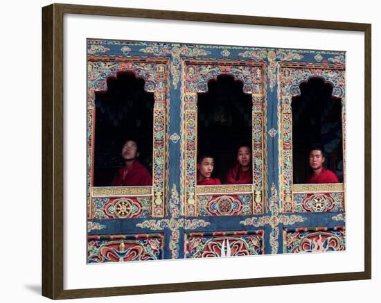 Buddhist Monks Look Through the Windows into the Courtyard of the Tango Monestary Near Thimphu-null-Framed Photographic Print