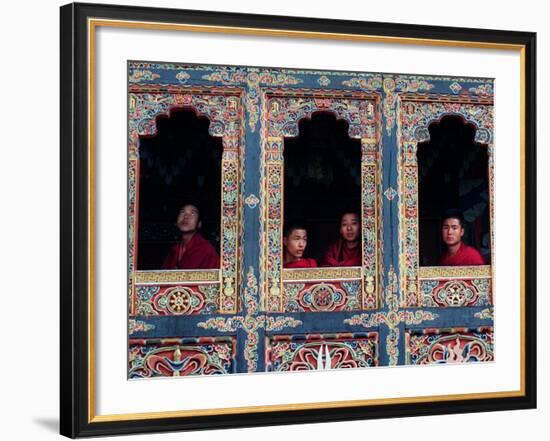 Buddhist Monks Look Through the Windows into the Courtyard of the Tango Monestary Near Thimphu-null-Framed Photographic Print